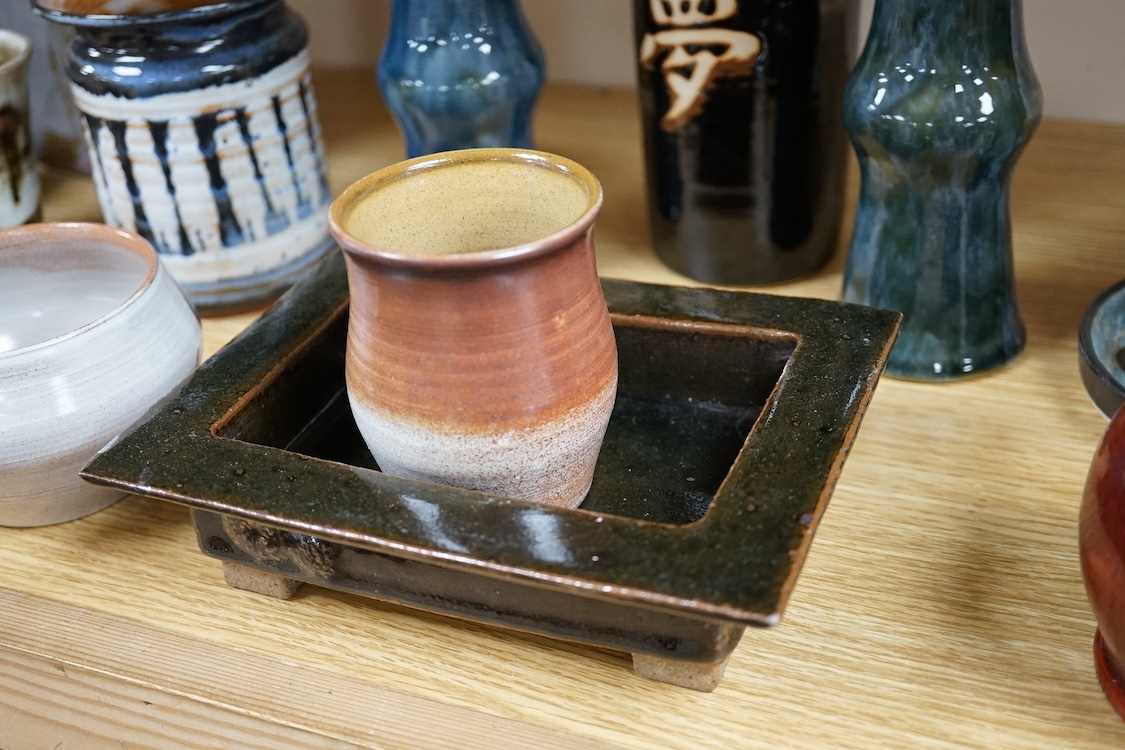 A collection of studio pottery to include a Celtic pottery Newlyn goblet, various jugs and bowls, largest 19cm high